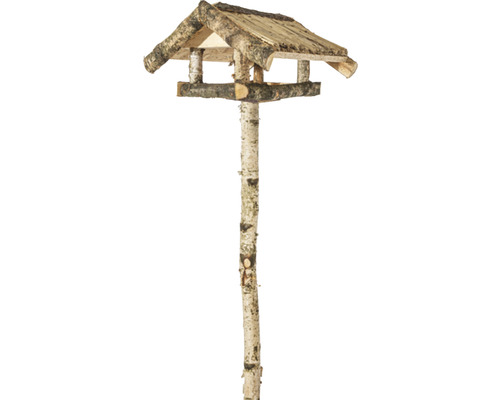 Vogelhaus aus Holz auf einem Baumstamm