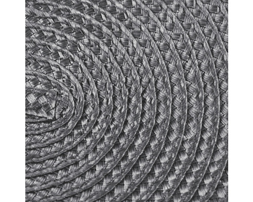 Detailaufnahme eines runden, geflochtenen Platzsets