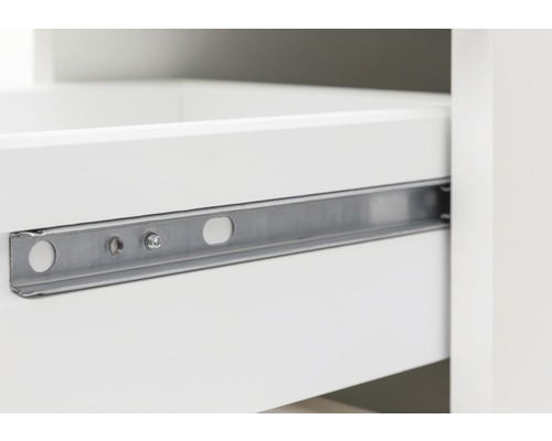 Detailaufnahme eines Möbelstücks mit Schubladenauszug