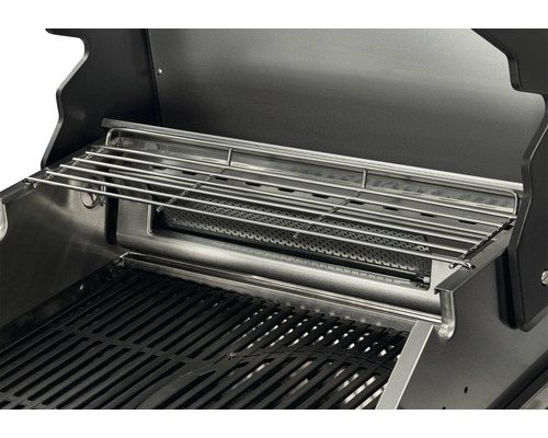 Innenansicht eines Grills mit Warmhalterost und Grillrost