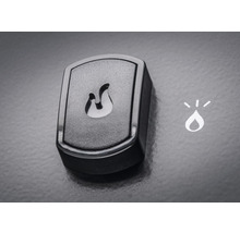 Detailaufnahme eines Bedienelements mit Flammensymbol und Wassertropfensymbol