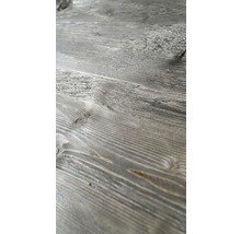Nahaufnahme einer grauen Holzoberfläche mit Maserung