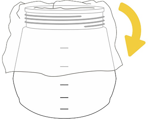 Einmachglas mit Stofftuch und gelbem Pfeil