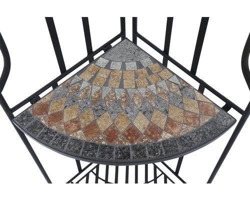 Detailansicht einer Eckablage mit Mosaikmuster auf einem schwarzen Metallgestell