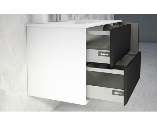 Waschtischunterschrank mit zwei Schubladen, teilweise geöffnet.