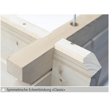 Detailaufnahme einer symmetrischen Eckverbindung aus Holz