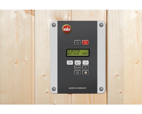WEKA Logo. Steuergerät für Sauna an einer Holzwand montiert.