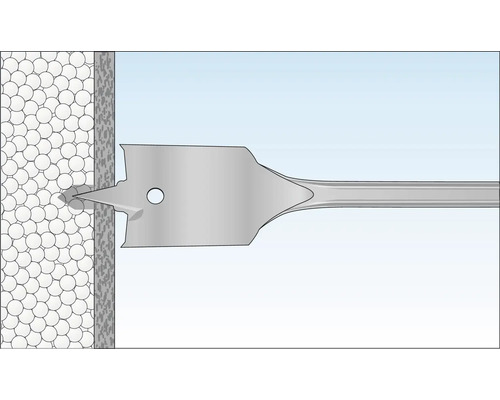 Ein Forstnerbohrer bohrt in eine Wand.