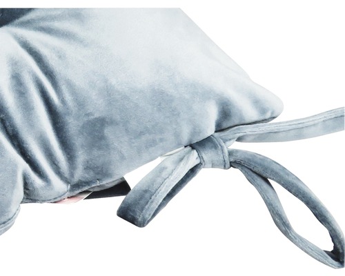 Nahaufnahme eines Sitzkissens mit Schleifenbändern zur Befestigung