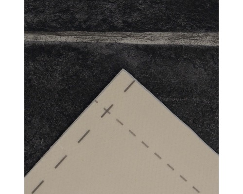 Detailansicht einer Musterfliese auf dunklem Untergrund