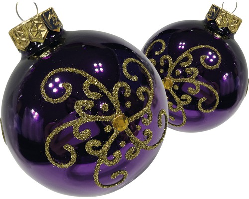 Zwei violette Weihnachtskugeln mit Ornamenten