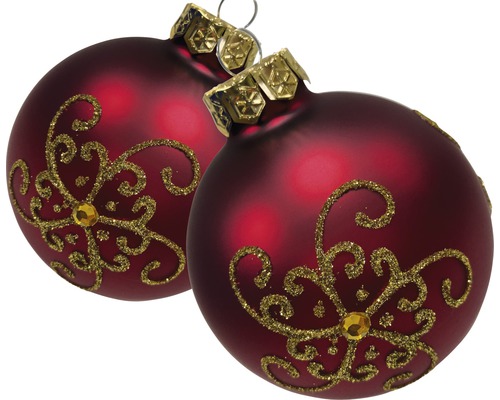 Zwei rote Weihnachtskugeln mit goldfarbenen Verzierungen