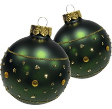 Zwei dunkelgrüne Weihnachtskugeln mit goldenen Verzierungen.