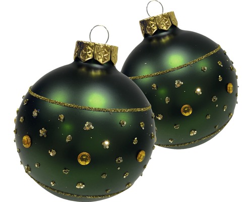 Zwei dunkelgrüne Weihnachtskugeln mit goldenen Verzierungen.