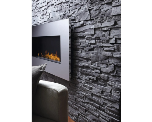 Wohnzimmerwand mit Verblendsteinen und Kamin