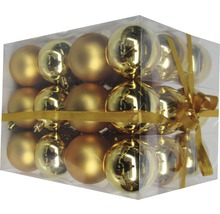 Verpackung goldfarbener Weihnachtskugeln mit Schleife