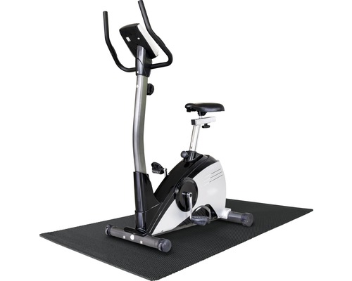 Heimtrainer auf einer Bodenschutzmatte für Fitnessgeräte
