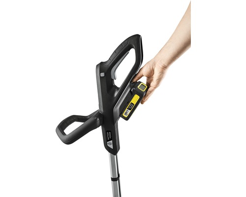 Aufsicht auf einen Akku-Rasentrimmer mit eingesetztem Akku.