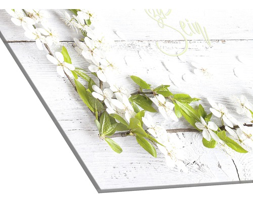 Dekorative Leinwand mit Blütenzweig Motiv für eine frühlingshafte Atmosphäre