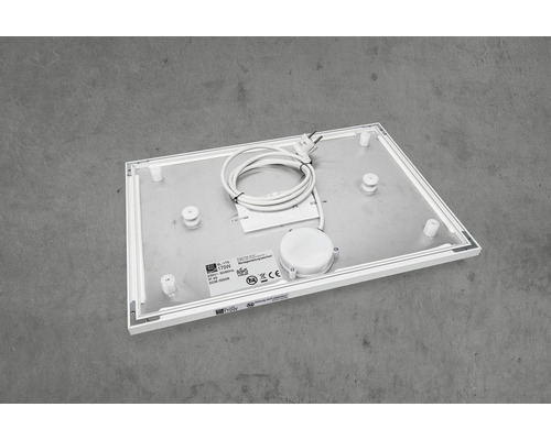 Rückseite einer Infrarotheizung mit Stecker und Montageelementen