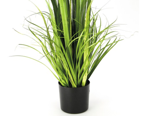 Künstliche Pflanze mit grünen Blättern in einem Topf