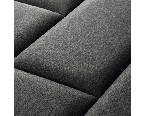 Nahaufnahme einer grauen, gesteppten Wandpaneele