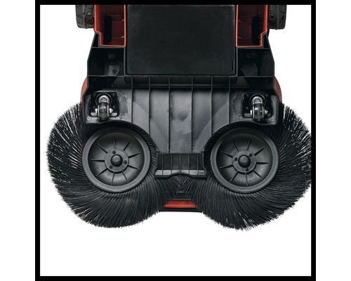 Kehrmaschine mit rotierenden Bürsten und Rollen zur Reinigung von Oberflächen.