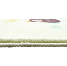Detailansicht eines Teppichs mit Eulenmotiv