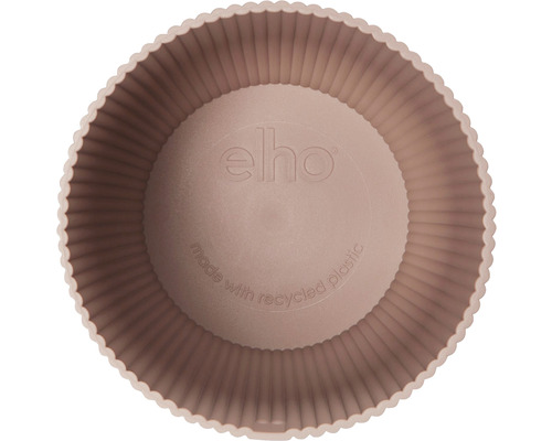 Innenansicht eines runden Blumentopfes aus recyceltem Kunststoff mit gewelltem Rand