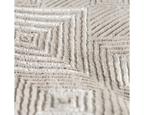 Detailansicht eines Teppichs mit geometrischem Muster