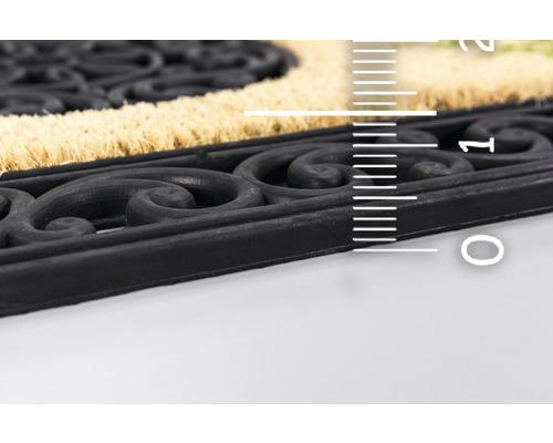 Detailansicht einer Fußmatte aus Kokosfaser mit Ornamenten