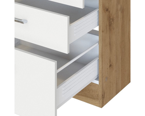 Detailaufnahme eines Möbelschranks mit offenen Schubladen