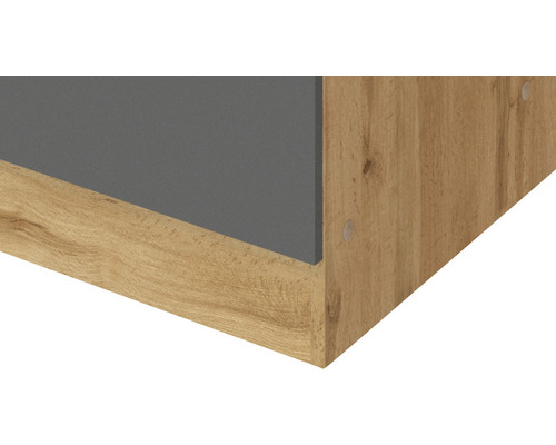 Detailaufnahme eines Möbelstücks mit Holzstruktur und grauer Oberfläche