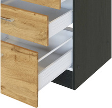 Schrank mit Schubladen in Holzoptik und offenem Auszug