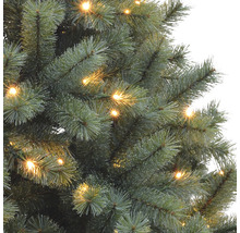 Detailaufnahme eines beleuchteten künstlichen Weihnachtsbaums.