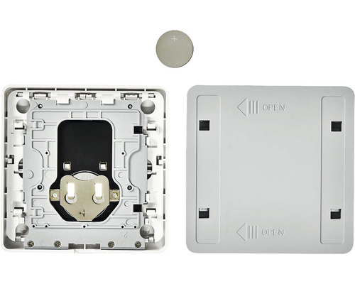 Innenansicht eines Raumthermostats mit Knopfzelle und Gehäuseabdeckung