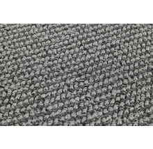 Detailaufnahme eines grauen Teppichs