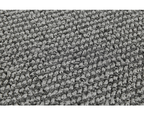 Detailaufnahme eines grauen Teppichs