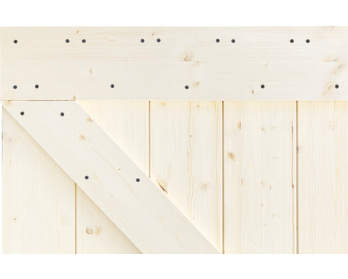 Detailansicht einer Holztür mit diagonalem Verstärkungsbrett