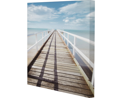 Leinwandbild eines Stegs, der ins Meer führt