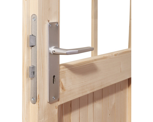 Türschloss und Türklinke aus Metall an Holztür