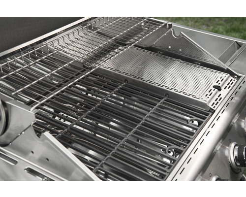 Innenansicht eines Grills mit Grillrost und Warmhalterost