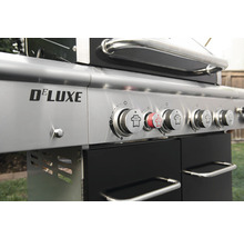 Detailaufnahme eines Gasgrills der Marke Deluxe mit Bedienknöpfen