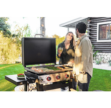 Personen grillen mit einem Nexgrill Grill im Freien.