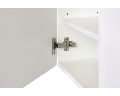 Scharnier an einer weißen Schranktür