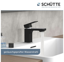 Schwarzer Waschtischmischer mit laufendem Wasserhahn im Badezimmer