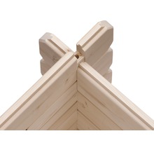 Detailansicht einer Eckverbindung eines Holzhauses