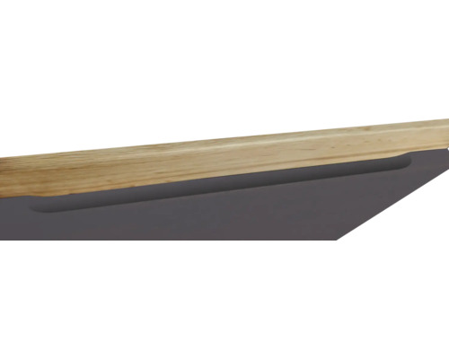 Detailansicht einer Tischkante mit Holzoberfläche und Schubladenauszug