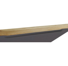 Detailansicht eines Möbelstücks mit Holzplatte und Griff