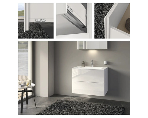 Badezimmer mit weißem Waschtischunterschrank mit zwei Schubladen und passendem Spiegelschrank